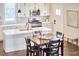 Charming kitchen with white countertops, pendant lighting, and a center island at 941 W Club Blvd, Durham, NC 27701
