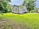 Expansive backyard with lush green grass surrounding the house at 1000 Roundtable Ct, Knightdale, NC 27545