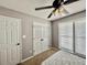 Neutral bedroom with closed closet door and ceiling fan at 1000 Roundtable Ct, Knightdale, NC 27545