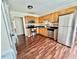 Kitchen featuring stainless steel appliances, wood cabinets, and wood flooring at 1000 Roundtable Ct, Knightdale, NC 27545