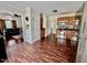 Open-concept kitchen and living area with hardwood floors and modern appliances at 1000 Roundtable Ct, Knightdale, NC 27545