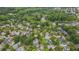 Serene aerial shot of a neighborhood surrounded by lush trees and manicured lawns at 102 Newell St, Chapel Hill, NC 27516