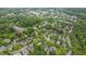 Overhead shot of a leafy neighborhood featuring a mix of charming residential houses at 102 Newell St, Chapel Hill, NC 27516