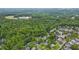Birds-eye view of a leafy neighborhood with mature trees, offering a tranquil setting at 102 Newell St, Chapel Hill, NC 27516