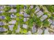 Aerial view of a residential neighborhood with mature trees and well-maintained homes at 102 Newell St, Chapel Hill, NC 27516