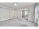 Spacious bedroom with wall-to-wall carpeting, ample closet space, and plenty of natural light at 102 Newell St, Chapel Hill, NC 27516