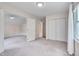 Inviting bedroom with plush carpeting, abundant closet space, and lots of natural light from the window at 102 Newell St, Chapel Hill, NC 27516
