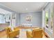 Stylish living room with hardwood floors, a cozy fireplace, and comfortable seating, perfect for relaxation and entertaining at 102 Newell St, Chapel Hill, NC 27516