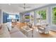 Bright living room with hardwood floors and french doors leading to an outdoor space at 102 Newell St, Chapel Hill, NC 27516