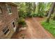 The backyard includes a fenced-in area, brick patio and direct entry to the brick home at 103 Tiara Ct, Garner, NC 27529