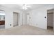 A light-filled bedroom featuring a closet, neutral carpeting, and serene ambiance at 103 Tiara Ct, Garner, NC 27529