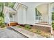 Charming front entrance with well-manicured landscaping at 110 Phyllis Dr, Benson, NC 27504