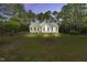 Exterior of the home with a well-maintained yard and landscaping at 110 Phyllis Dr, Benson, NC 27504
