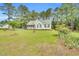 Quaint single-story home with a well-manicured lawn and inviting curb appeal at 110 Phyllis Dr, Benson, NC 27504