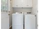Bright laundry room with washer and dryer at 110 Phyllis Dr, Benson, NC 27504