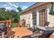 This beautiful wooden deck features an outdoor grill, seating area, and access to the home at 1211 Azalea Dr, Zebulon, NC 27597
