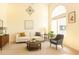 Staged living room featuring light walls, modern furniture, and ample light for comfortable and stylish living at 1211 Azalea Dr, Zebulon, NC 27597