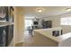 Upstairs bonus room featuring a wall calendar, neutral walls, plush carpet, and natural light at 1249 Turkey Trot Rd, Wendell, NC 27591