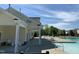 Inviting community pool area with a covered seating area and plenty of lounge chairs for residents to enjoy at 1249 Turkey Trot Rd, Wendell, NC 27591