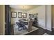 Formal dining room with decorative molding, modern light fixture and stylish furnishings at 1249 Turkey Trot Rd, Wendell, NC 27591