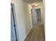 Hallway with neutral carpet and white walls at 1249 Turkey Trot Rd, Wendell, NC 27591
