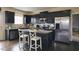 Modern kitchen with granite countertops, stainless steel appliances, and a central island at 1249 Turkey Trot Rd, Wendell, NC 27591