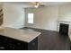 Open floor plan featuring a kitchen island and a fireplace at 1249 Turkey Trot Rd, Wendell, NC 27591