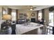 Inviting living room features hardwood floors, fireplace, and elegant furnishings at 1249 Turkey Trot Rd, Wendell, NC 27591