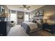 Serene main bedroom with a neutral palette, plush carpeting, and ample natural light from large windows at 1249 Turkey Trot Rd, Wendell, NC 27591