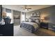 Serene main bedroom with a neutral palette, plush carpeting, and ample natural light from large windows at 1249 Turkey Trot Rd, Wendell, NC 27591