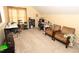 Large bonus room with ample natural light, carpet flooring, and multiple seating areas at 1333 Beaufort Dr, Graham, NC 27253