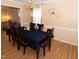 Well-lit dining room with a large table, seating for six, and elegant decor at 1333 Beaufort Dr, Graham, NC 27253