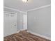 Comfortable bedroom with closet and views to other rooms in the house at 134 Nelson St, Durham, NC 27707