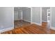 Inviting living room showcasing beautiful hardwood floors and neutral wall paint at 134 Nelson St, Durham, NC 27707