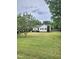 Charming single story home with a spacious lawn and mature shade trees at 1360 Honeycutt Rd, Willow Springs, NC 27592