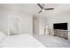 Light-filled bedroom with neutral tones, ceiling fan, and modern decor at 1515 Millrock Trl, Wendell, NC 27591