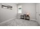 Cozy bedroom with neutral tones, plush carpeting, and window with natural light at 1515 Millrock Trl, Wendell, NC 27591