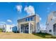 The home's rear exterior showcases a screened-in porch, perfect for outdoor relaxation and enjoying the expansive backyard space at 160 N Finley Landing Pkwy, Smithfield, NC 27577
