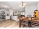 Open kitchen with modern appliances and dining table at 18 Hunter Fox Trl, Angier, NC 27501