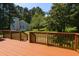 A stained backyard deck provides a space to relax outdoors at 200 Steeple Rd, Holly Springs, NC 27540