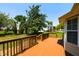 A stained backyard deck offers a quiet outdoor space at 200 Steeple Rd, Holly Springs, NC 27540