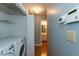 Laundry room featuring a washer, dryer and a glimpse into the adjacent bathroom at 200 Steeple Rd, Holly Springs, NC 27540