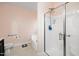 Bright bathroom with a glass shower stall, soaking tub, and tile flooring at 2033 Buck Corner Ln, Fuquay Varina, NC 27526