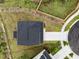 Aerial view of a house with a driveway, landscaping, and a fenced yard at 209 White Farm Dr, Wendell, NC 27591