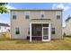 Spacious backyard featuring a screened-in porch, perfect for enjoying the outdoors, with room for activities at 209 White Farm Dr, Wendell, NC 27591