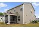 Spacious backyard featuring a screened-in porch, perfect for enjoying the outdoors, with room for activities at 209 White Farm Dr, Wendell, NC 27591