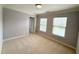 Bedroom featuring carpeting, crown molding, and natural light at 2107 Freeport Dr, Cary, NC 27519