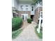 Charming two-story home with stone accents, and lush landscaping at 2107 Freeport Dr, Cary, NC 27519