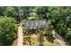 Beautiful aerial view of a two story home with a lush landscaped yard and lovely curb appeal at 2190 Keith Hills Rd, Lillington, NC 27546