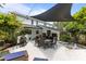 Expansive back deck with ample seating and dining options, shaded by a canopy, perfect for entertaining and relaxation at 2190 Keith Hills Rd, Lillington, NC 27546